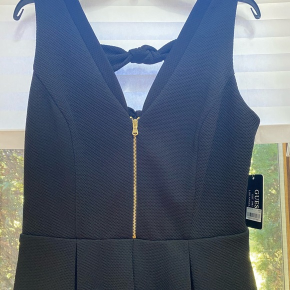 A “Must Have” Black Mini-Dress by Guess - Picture 3 of 6